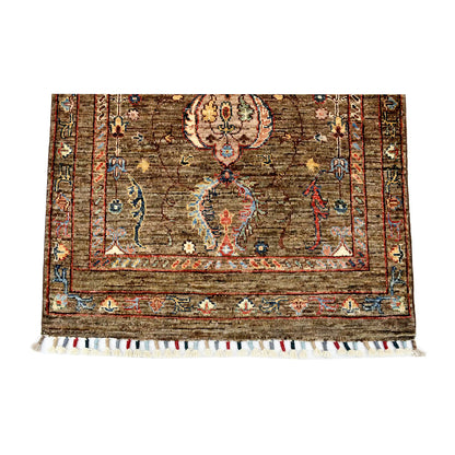 End border and fringe detail of Afghan Sultani hand-knotted rug showing floral motifs, layered border and multicolour fringe