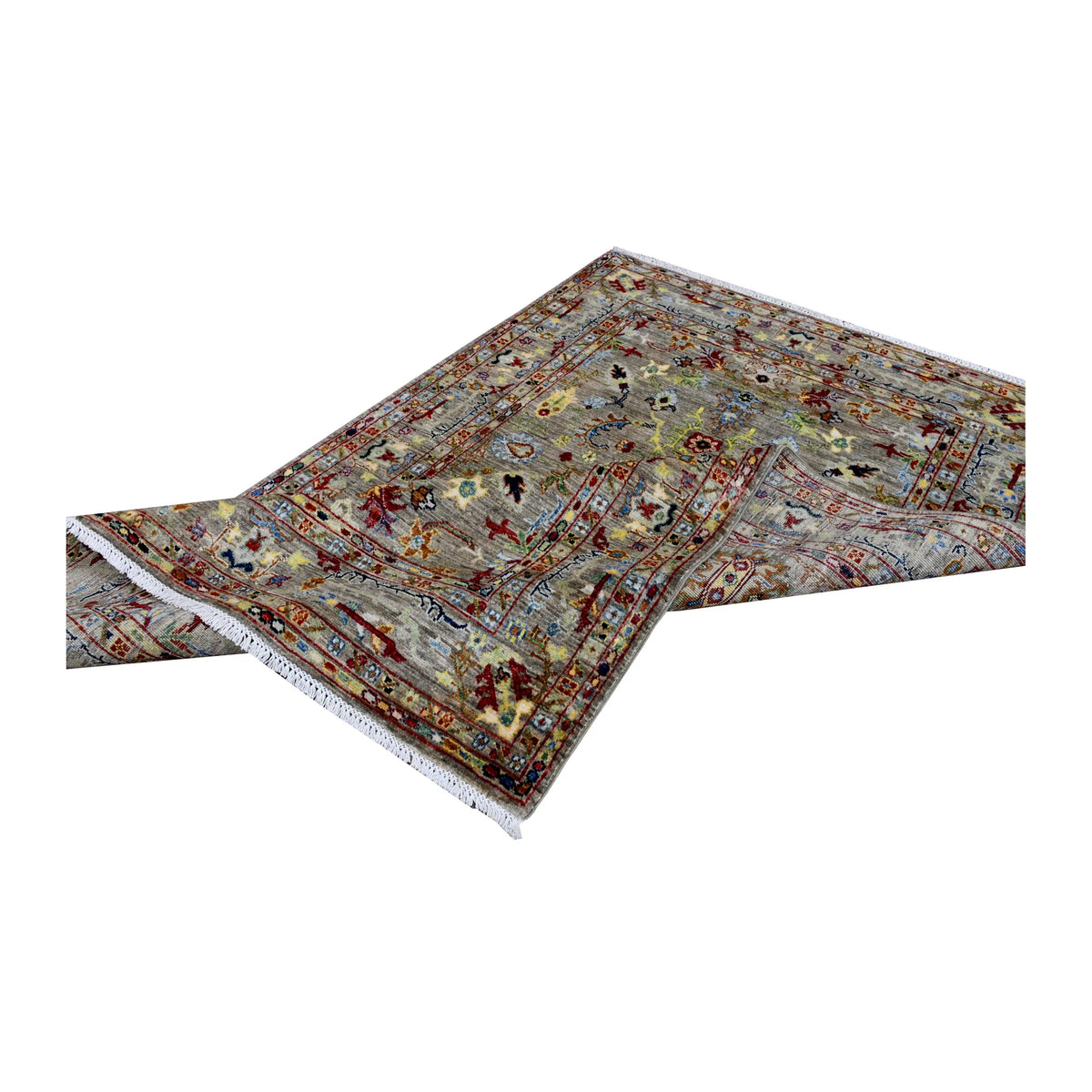 Folded view of Afghan Sultani wool rug showing its detailed field, layered borders and pale fringe