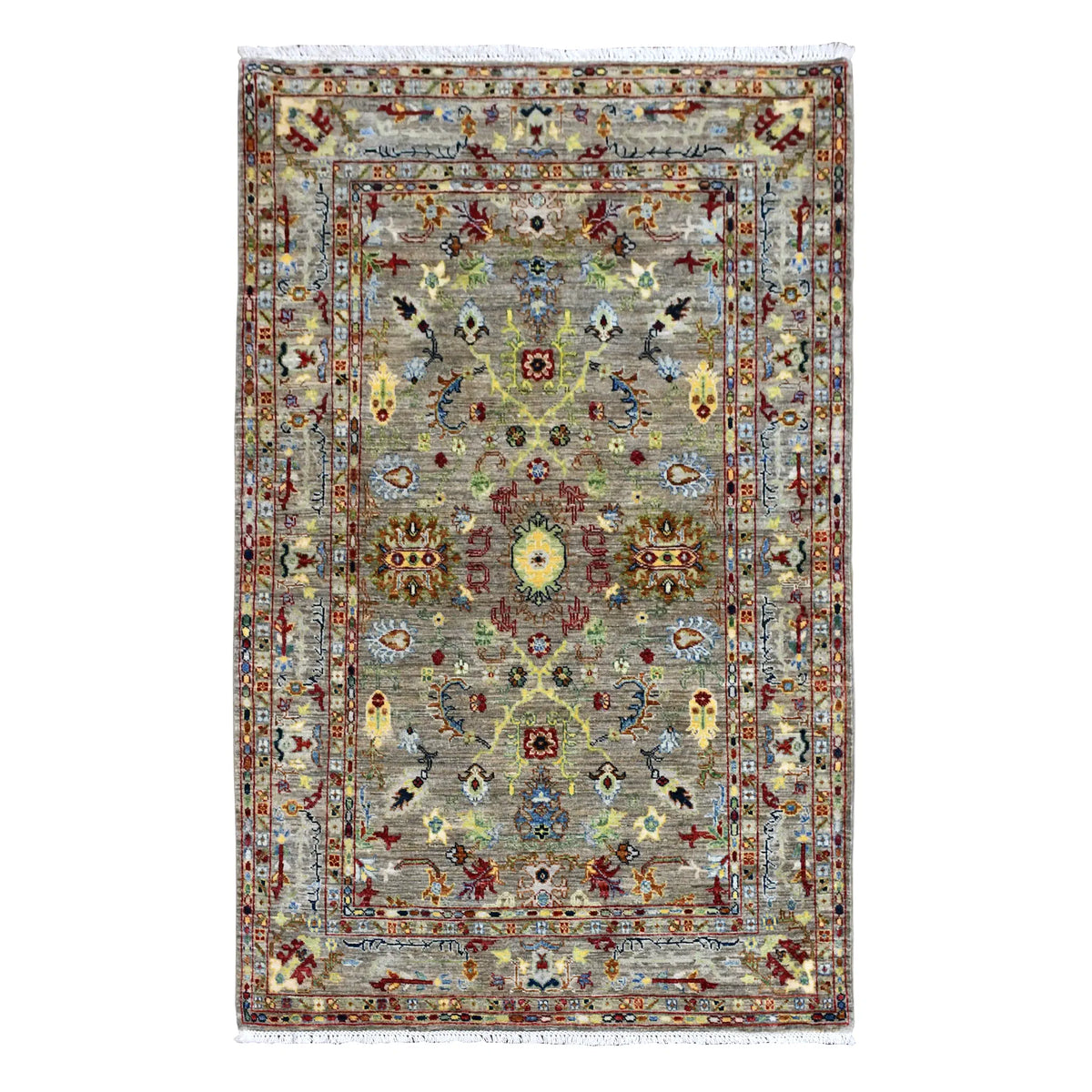 Full view of Afghan Sultani wool rug with grey-green field, central yellow-gold medallion and layered borders, 185 x 119 cm