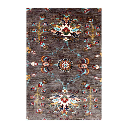 Central detail of Afghan Sultani rug showing linked floral rosettes, palmettes and slender turquoise vines