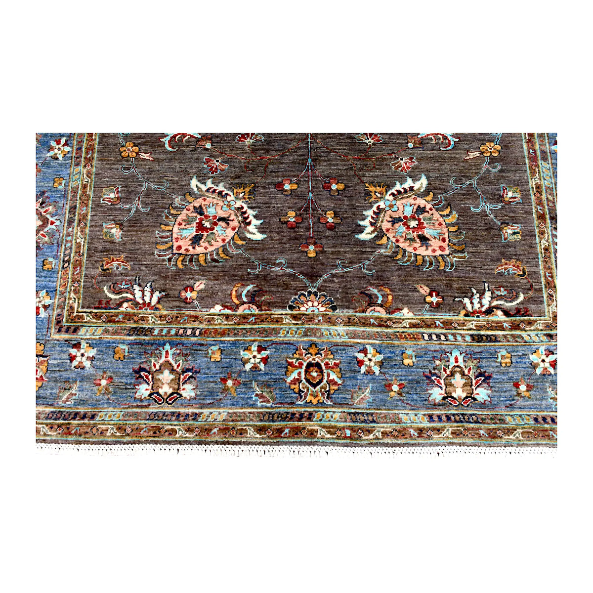 Fringe and end-border detail of Afghan Sultani rug showing blush-pink palmettes, blue floral bands and narrow guard borders
