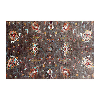 Field detail of Afghan Sultani wool rug showing symmetrical floral rosettes and turquoise vinework across the dark brown pile