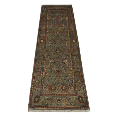 Full view of Afghan Sultani hand-knotted wool runner rug with muted sage field, floral motifs and detailed border, 214 x 74 cm