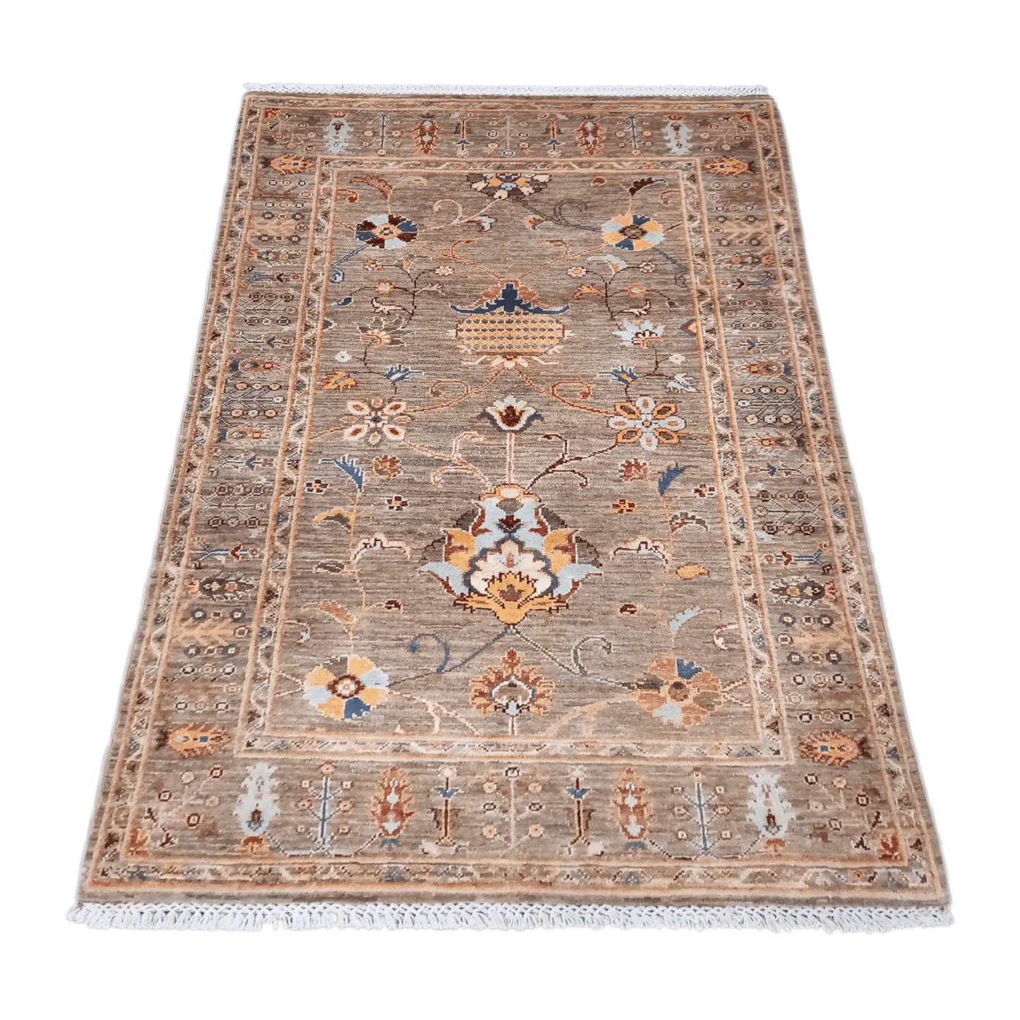 Angled view of Afghan Sultani wool rug with layered patterned borders, 157 x 101 cm
