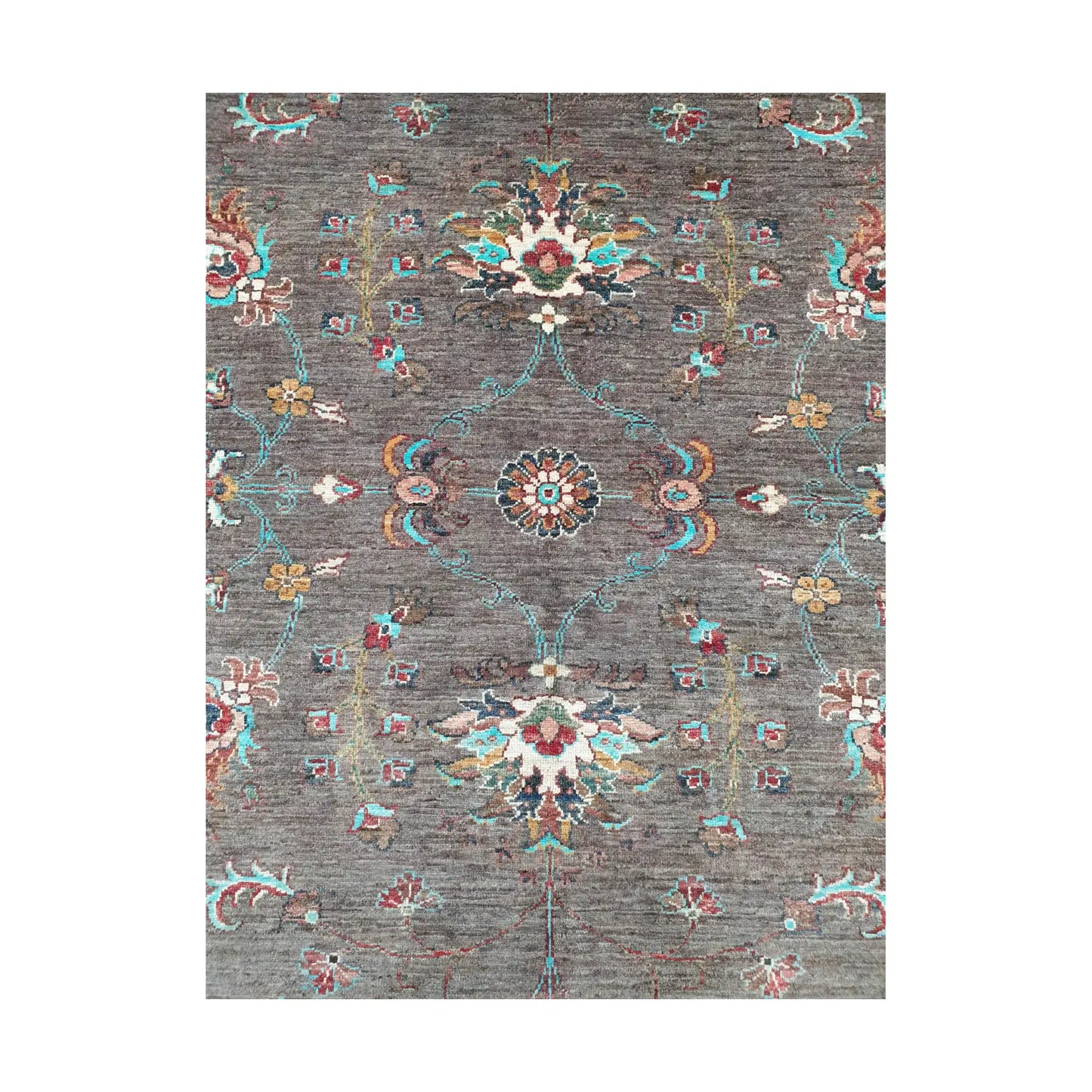 Close-up of Afghan Sultani wool rug showing dark brown field and floral medallion pattern detail