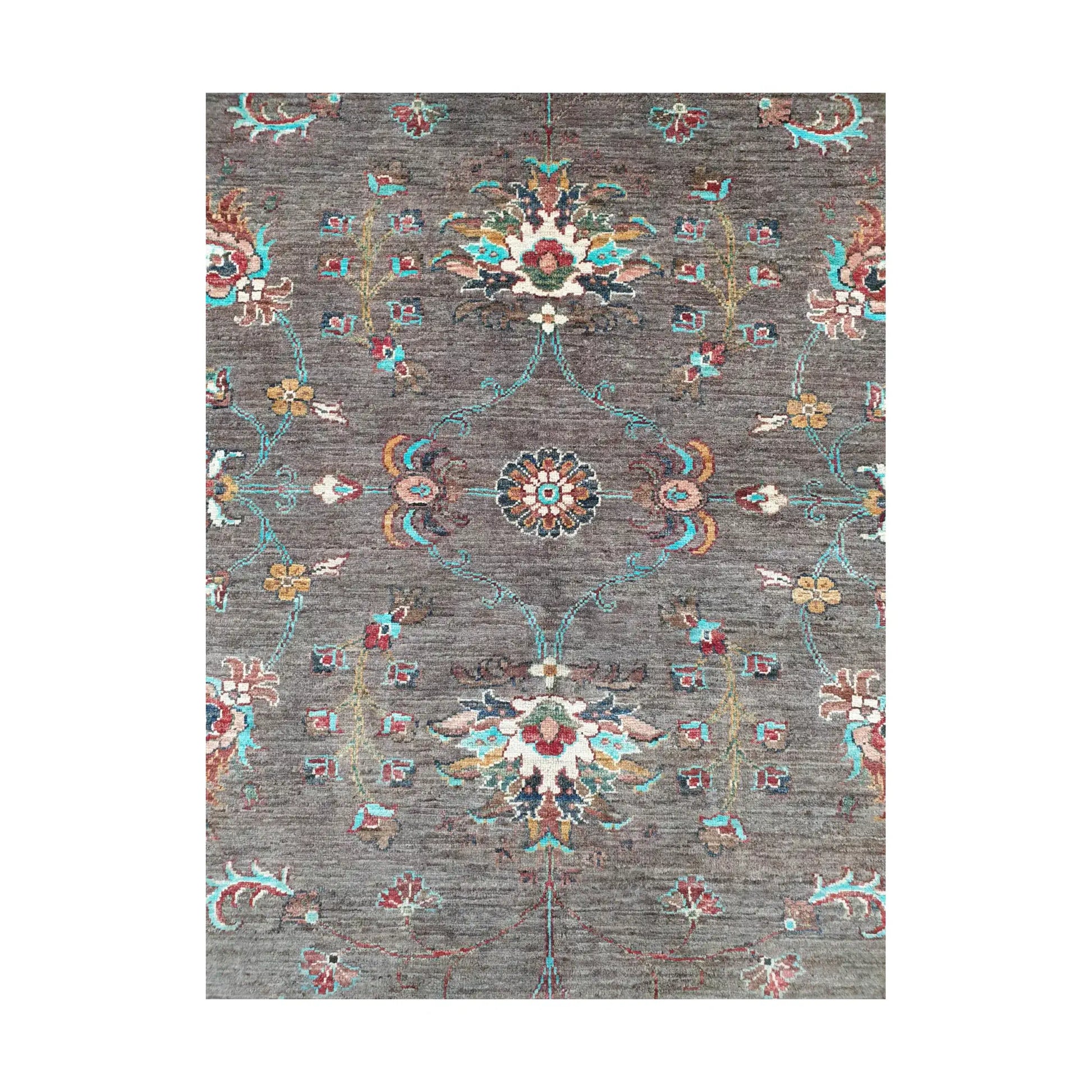 Close-up of Afghan Sultani wool rug showing dark brown field and floral medallion pattern detail