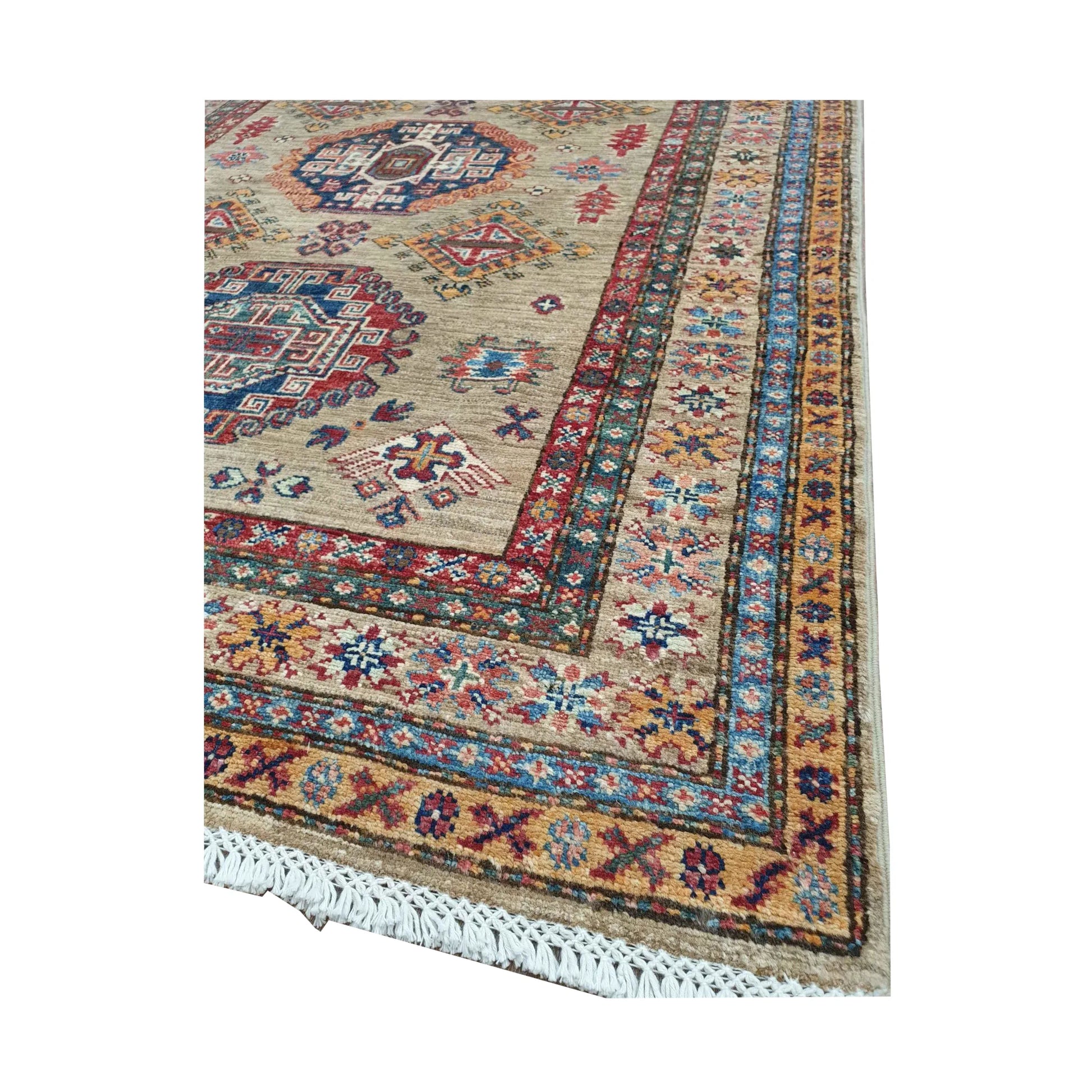 Border corner detail of Afghan Super Kazak hand-knotted wool rug showing blue border, fringe and wool texture
