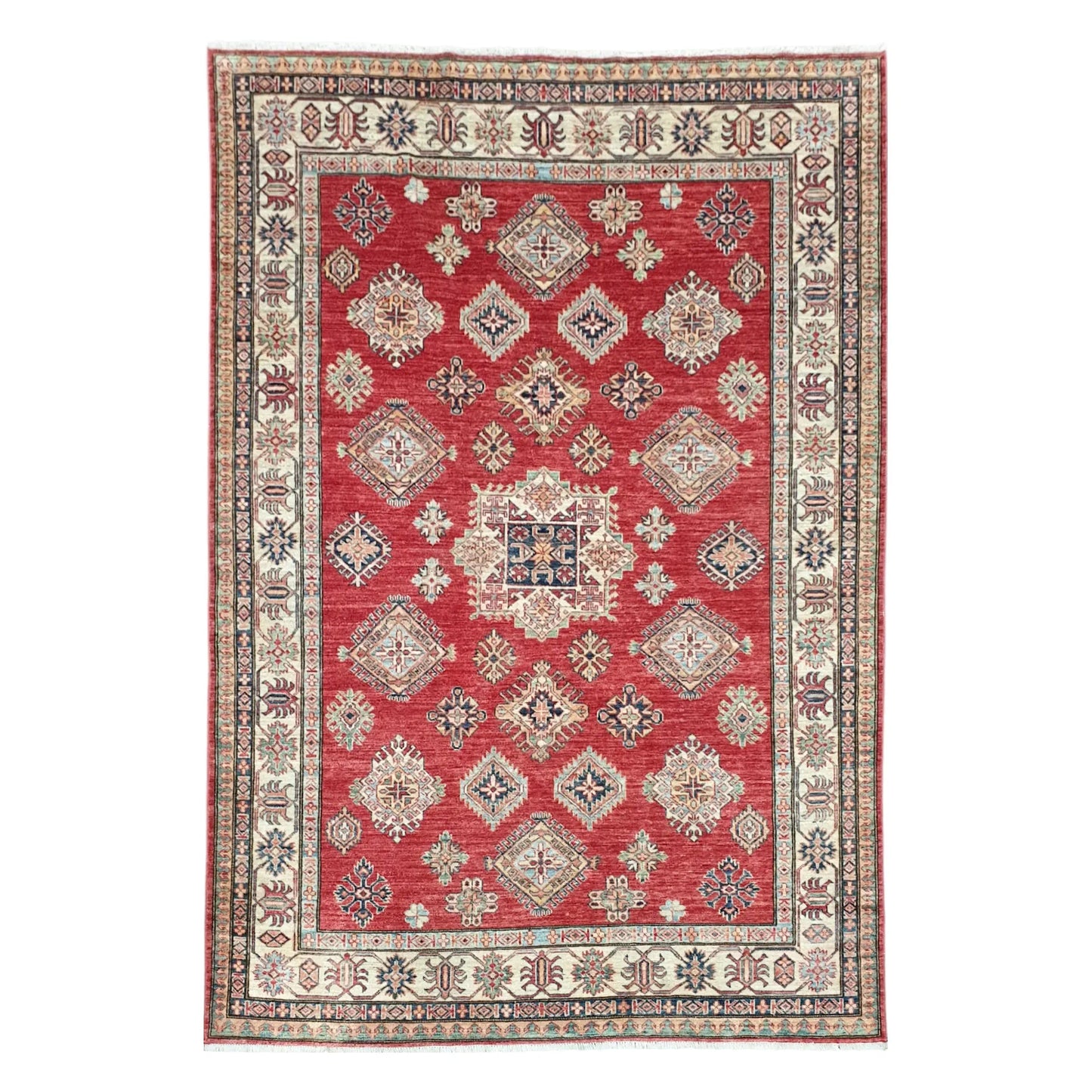 Full view of Afghan Super Kazak hand-knotted wool rug with a red field, diamond medallions and broad ivory border, 246 x 185 cm