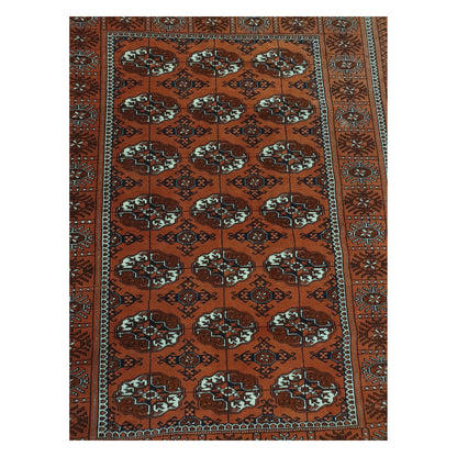 Geometric gul motif detail on Afghan Turkmen Tekke hand-knotted wool rug