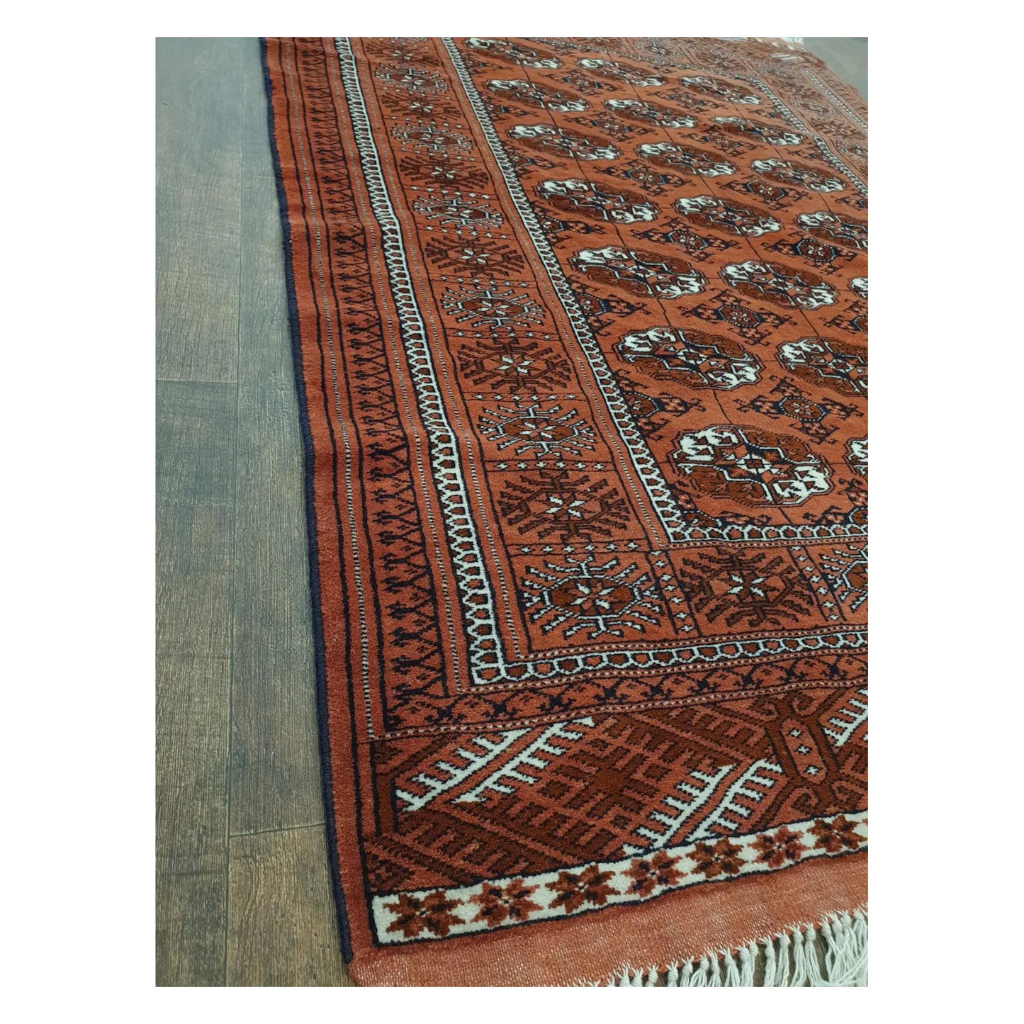 Side border detail of Afghan Turkmen Tekke wool rug with geometric tribal pattern
