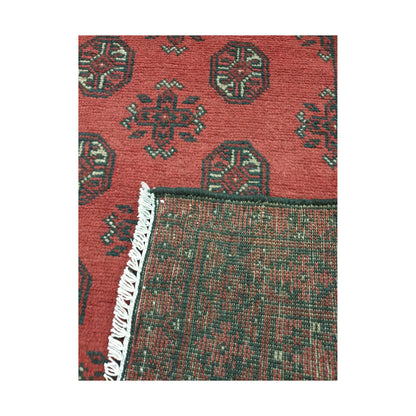 Reverse weave detail of Afghan Turkoman hand-knotted wool rug showing back construction and edge finish