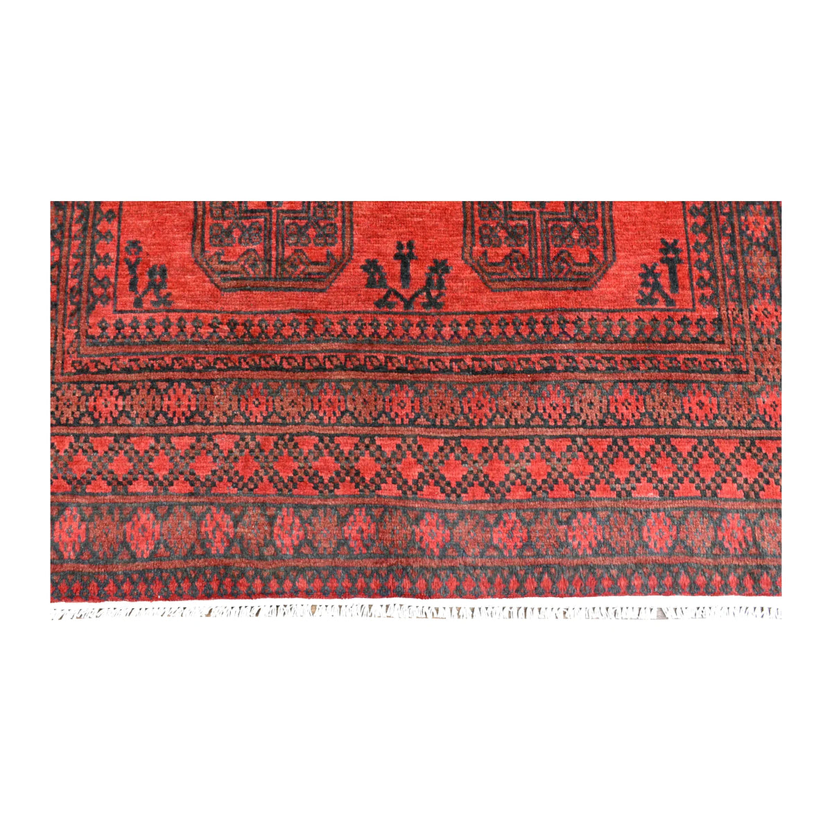 Fringe and end-border detail of Afghan Turkoman rug with layered black, burgundy and dark navy geometric bands
