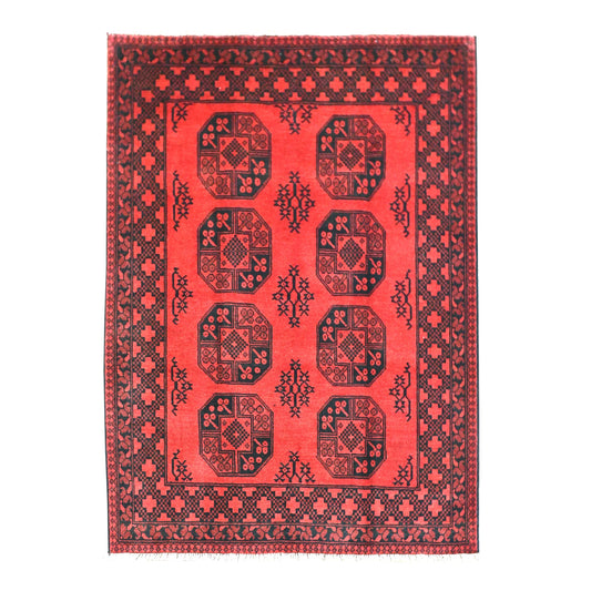 Full view of Afghan Turkoman rug with vivid red field, eight octagonal guls and layered dark borders, 198 x 153 cm