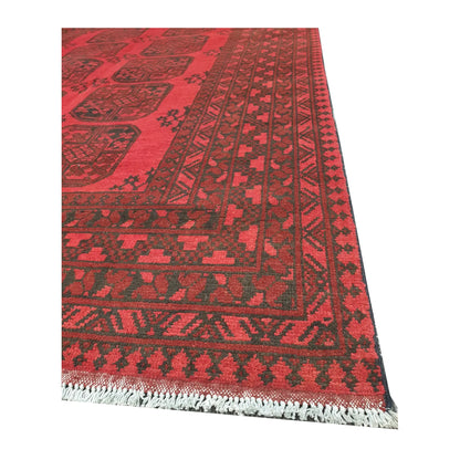 Corner and fringe detail of Afghan Turkoman hand-knotted wool rug with layered tribal border