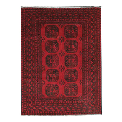 Full straightened view of Afghan Turkoman hand-knotted wool rug with red field and repeated gul-style medallions, 240 x 163 cm