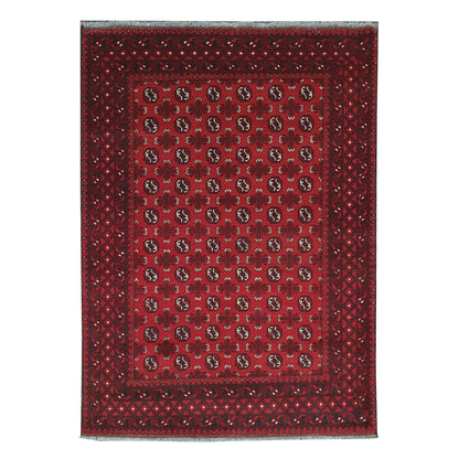 Full view of Afghan Turkoman hand-knotted wool rug with red field, dark motifs and ivory accents, 240 x 168 cm