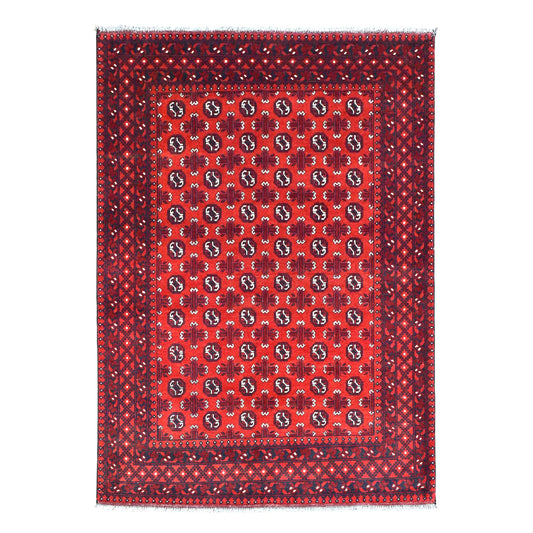 Full view of Afghan Turkoman hand-knotted wool rug with rows of dark guls on a red field and layered borders, 240 x 168 cm