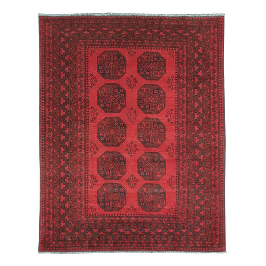 Full view of Afghan Turkoman hand-knotted wool rug with red field, repeating tribal motifs and ivory accents, 240 x 176 cm