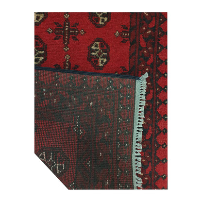 Reverse-weave and fringe detail of Afghan Turkoman wool runner rug showing back structure and hand-knotted pattern
