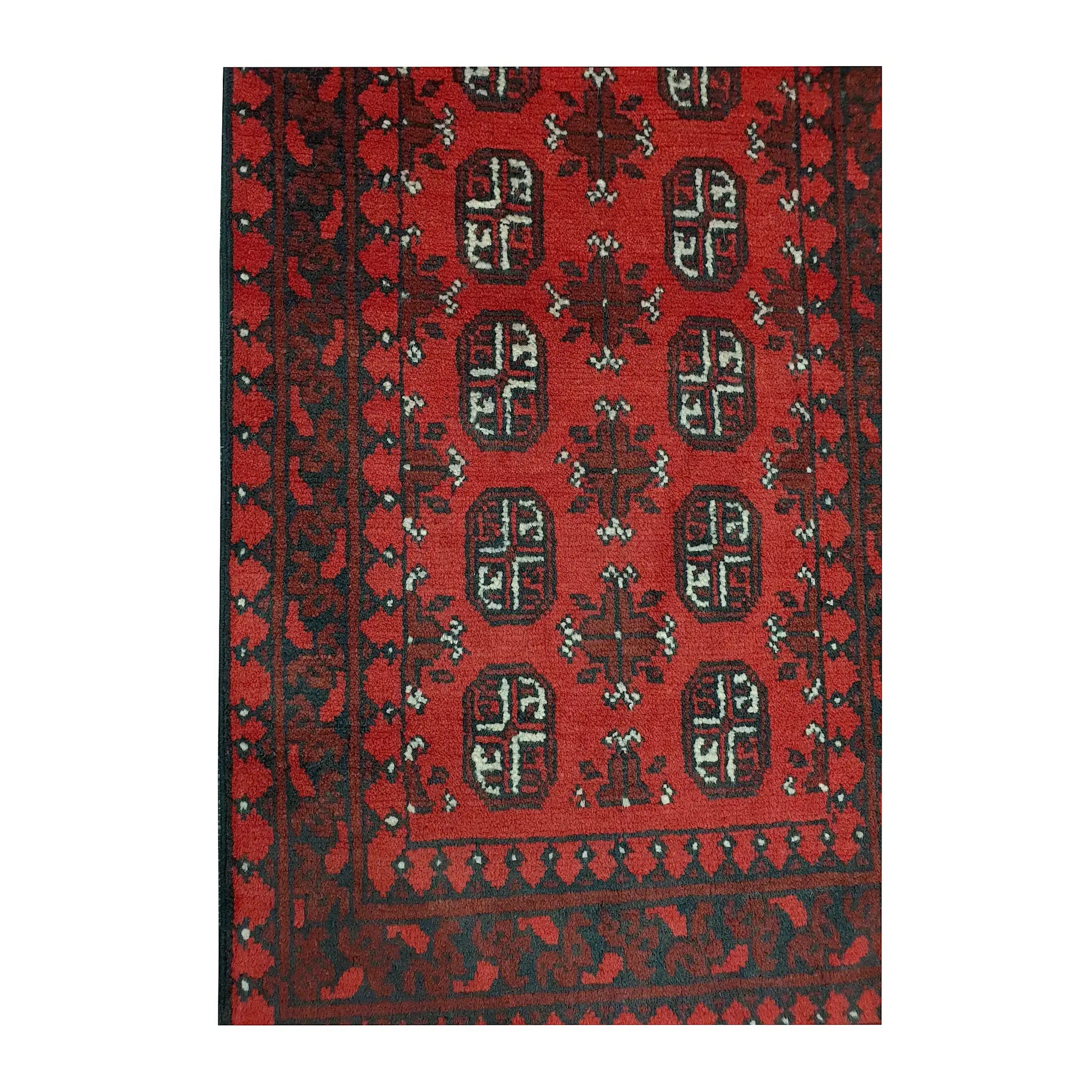 Border and field detail of Afghan Turkoman wool runner rug showing red pile, dark charcoal patterning and ivory accents