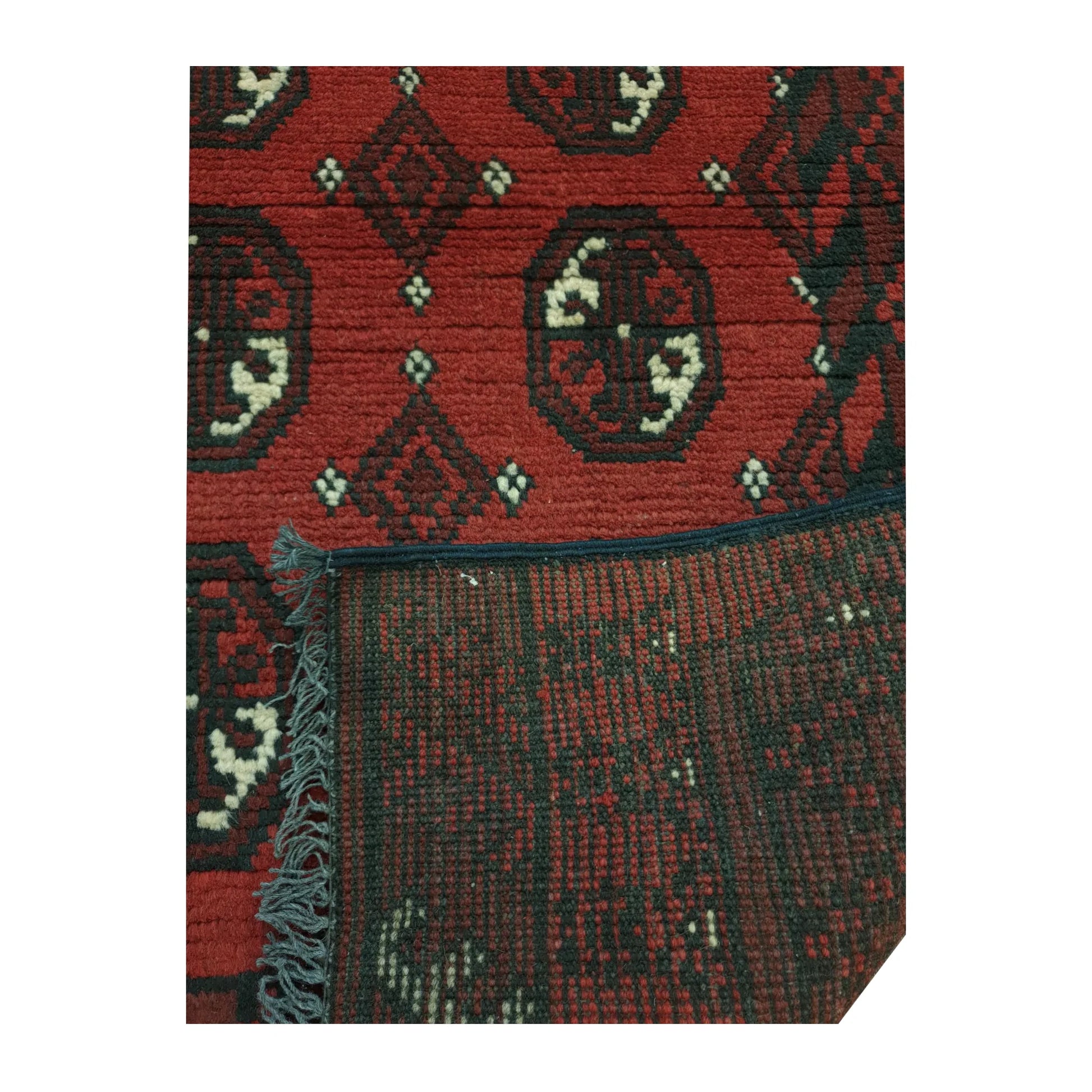 Reverse weave detail of Afghan Turkoman hand-knotted wool runner rug showing back construction and edge finish