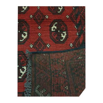 Reverse weave detail of Afghan Turkoman hand-knotted wool runner rug showing back construction and edge finish