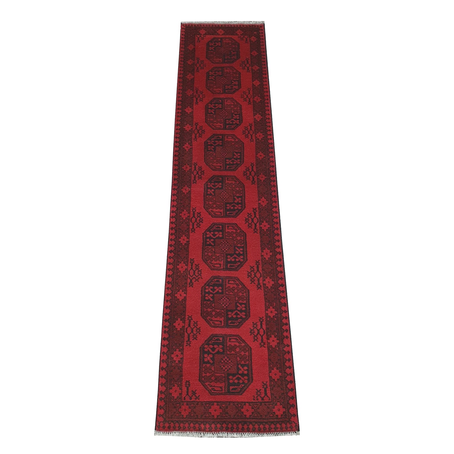 Full view of Afghan Turkoman hand-knotted wool runner rug with red field and repeated gul-style medallions, 291 x 64 cm