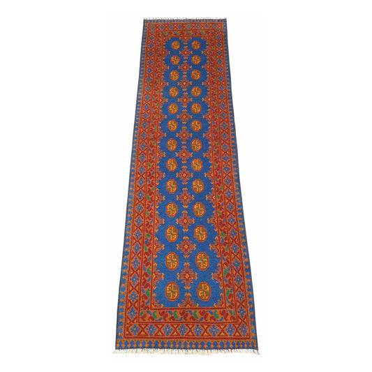 Full view of Afghan Turkoman hand-knotted wool runner rug with blue field and orange gul-style motifs, 293 x 82 cm