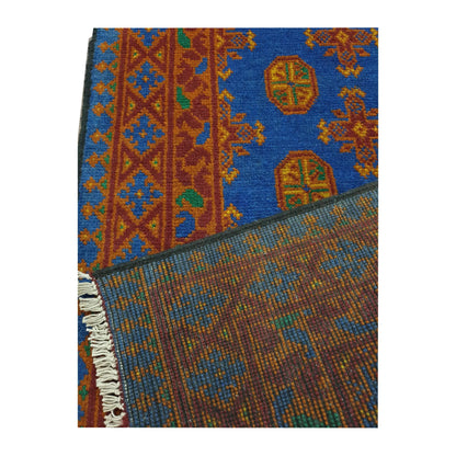 Reverse-weave detail of Afghan Turkoman wool runner rug showing back structure and fringe