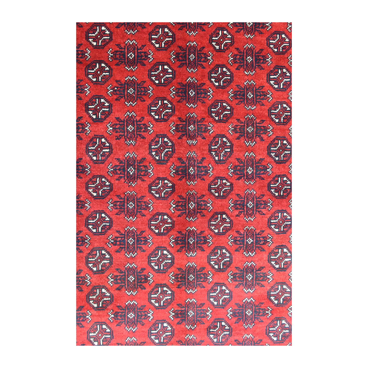 Field detail of the Afghan Turkoman rug showing octagonal guls alternating with taller angular motifs on red