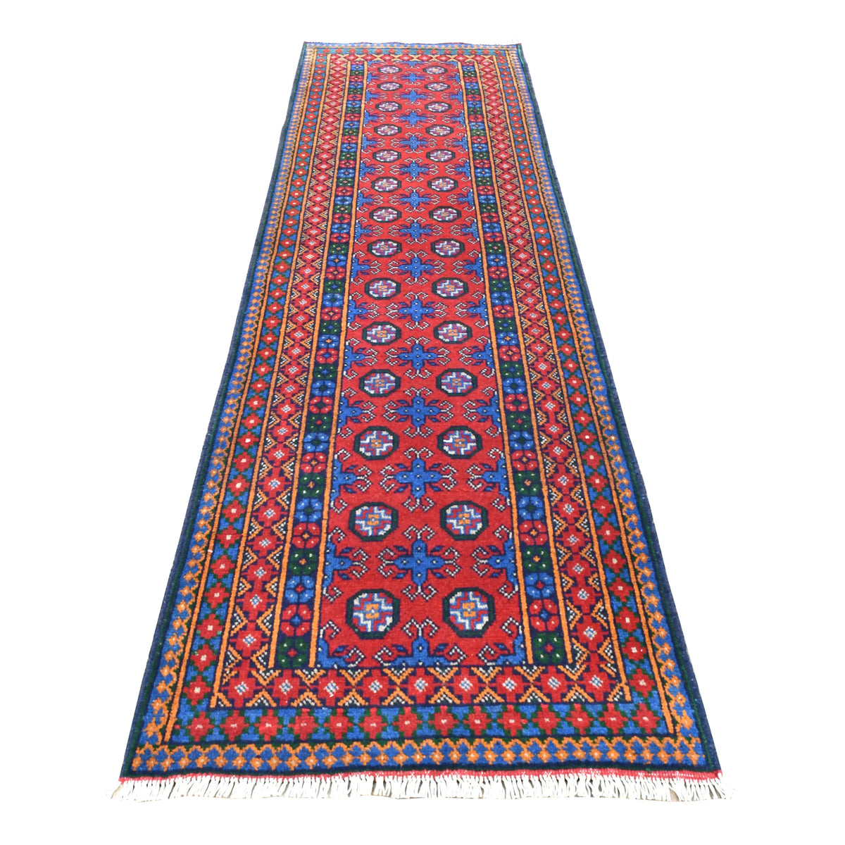 Full view of Afghan Turkoman runner with red field, blue four-pointed motifs, paired octagonal medallions and layered borders, 287 x 83 cm