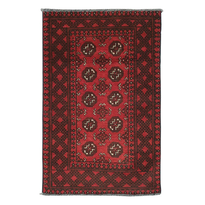 Afghan Turkoman rug 115 x 74 cm full view with red field, dark border and repeated gul medallion pattern
