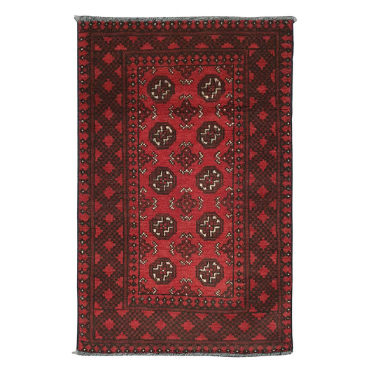 Afghan Turkoman rug 115 x 74 cm full view with red field, dark border and repeated gul medallion pattern