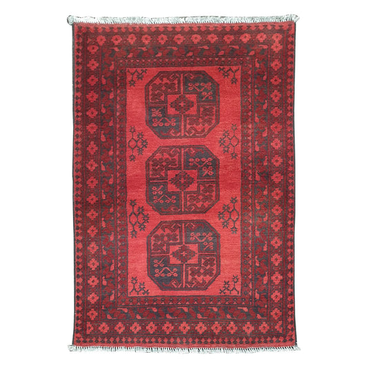 Afghan Turkoman rug 120 x 80 cm full view with red field, dark border and three charcoal gul medallions