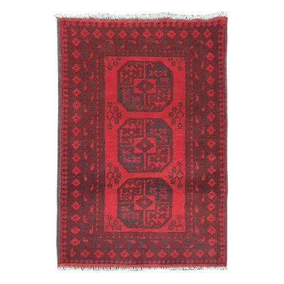 Afghan Turkoman rug 120 x 82 cm full view with red field, dark border and three gul motifs