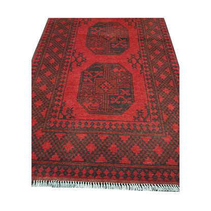 End field and fringe detail of Afghan Turkoman rug with red field, gul motifs and charcoal tribal border