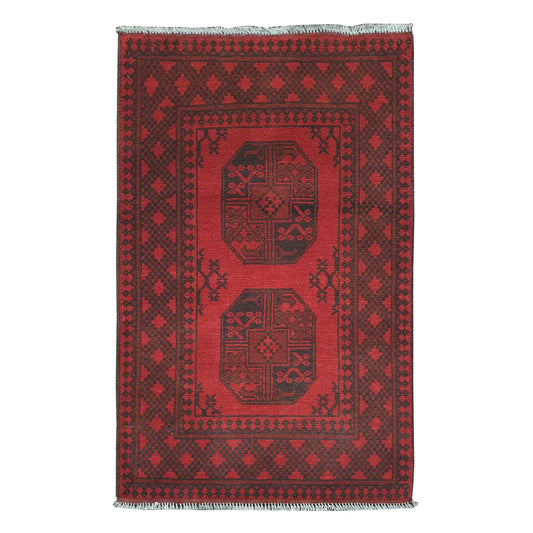 Afghan Turkoman rug 121 x 75 cm full view with red field, dark border and two central gul motifs