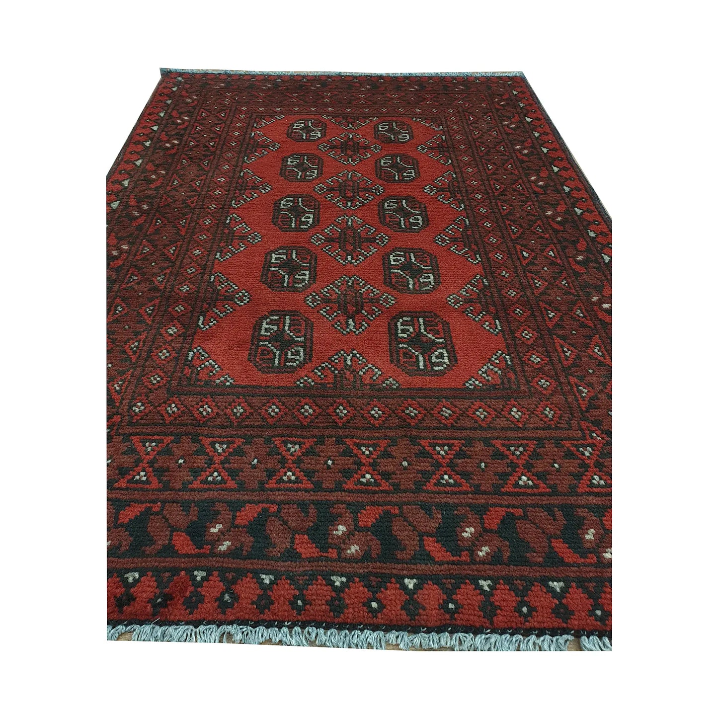 End field and fringe detail of Afghan Turkoman rug with red ground, twin column gul medallions and tribal border