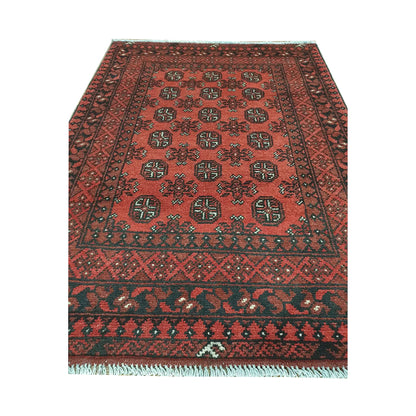 End field and fringe detail of Afghan Turkoman rug with red ground, repeated gul medallions and dark border