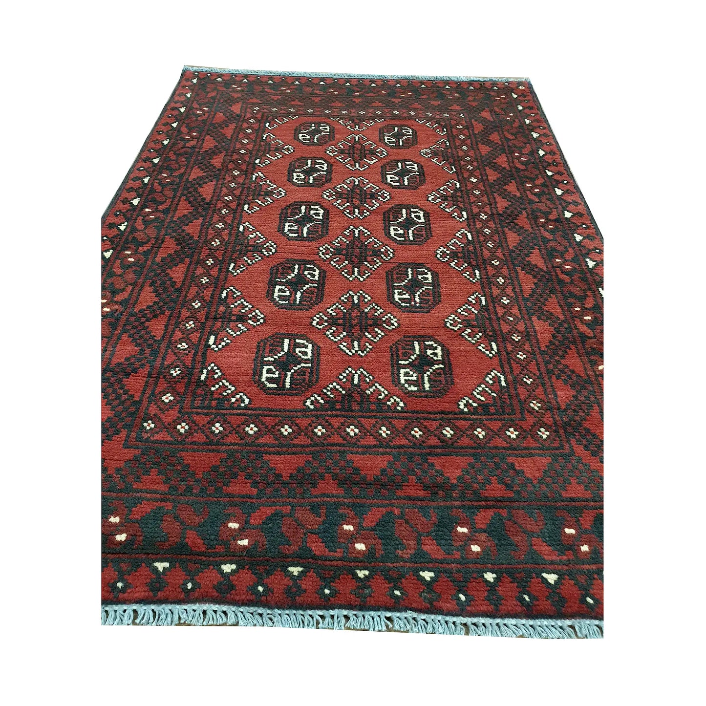 End field and fringe detail of Afghan Turkoman rug with red ground, gul medallions and dark tribal border