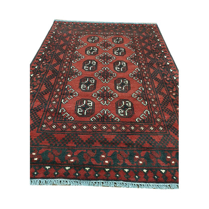 End field and fringe detail of Afghan Turkoman rug with red ground, gul medallions and dark tribal border