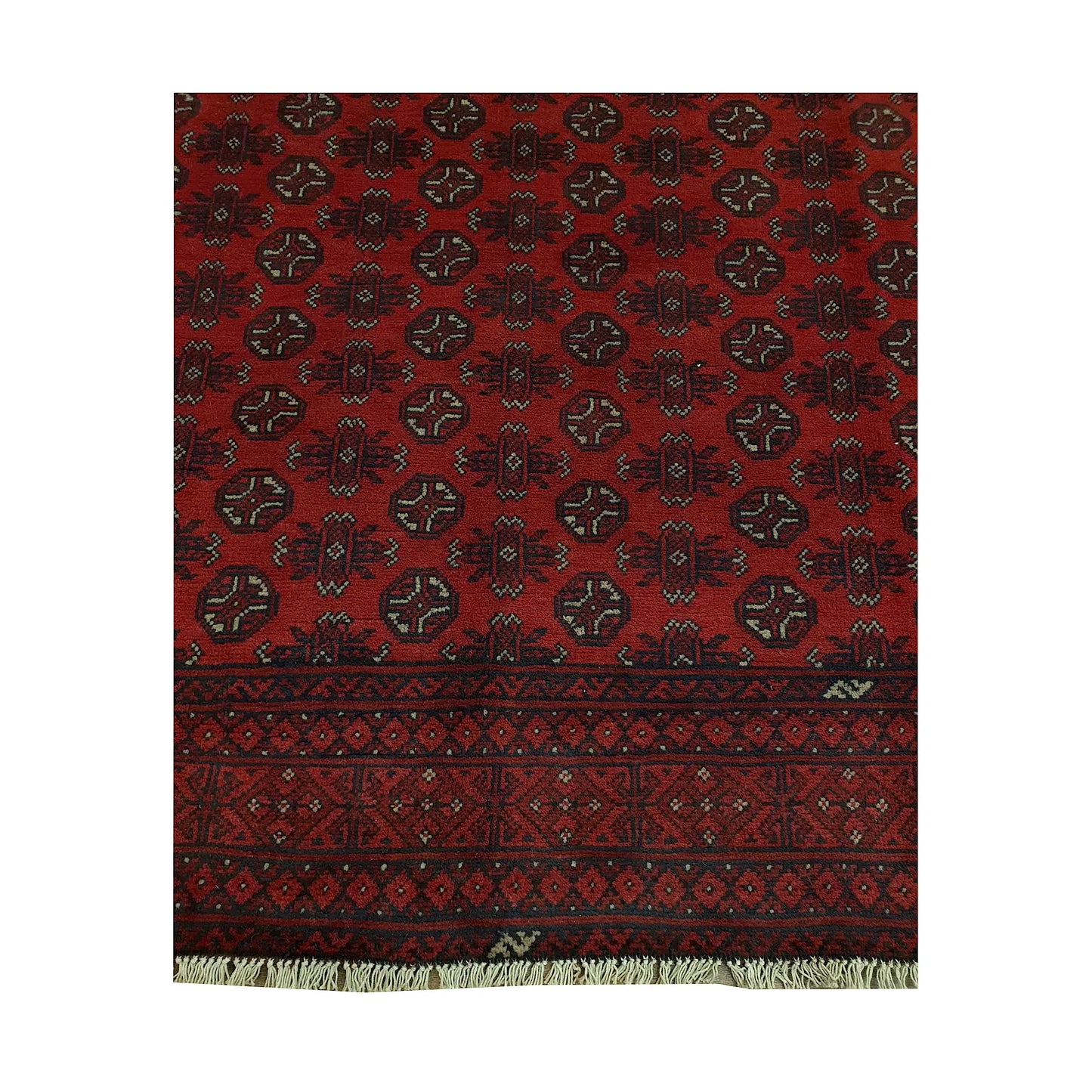 Gul field and border detail of Afghan Turkoman rug showing repeated medallions, deep red ground and dark geometric border