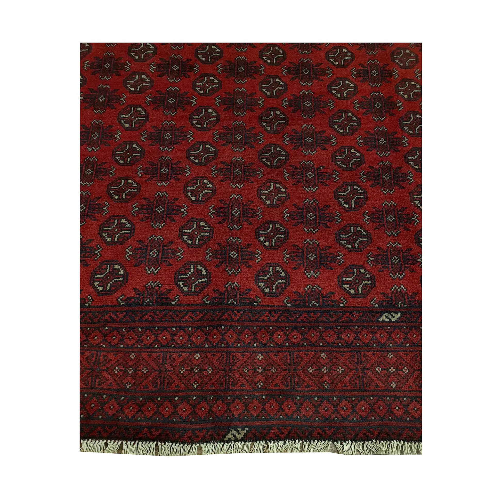 Gul field and border detail of Afghan Turkoman rug showing repeated medallions, deep red ground and dark geometric border