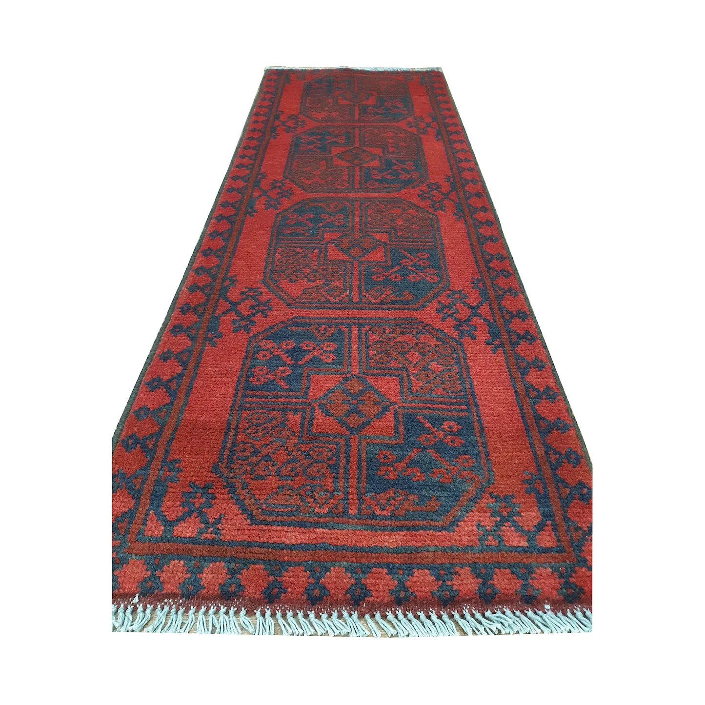 End field and fringe detail of Afghan Turkoman runner rug with red ground, four gul medallions and dark border