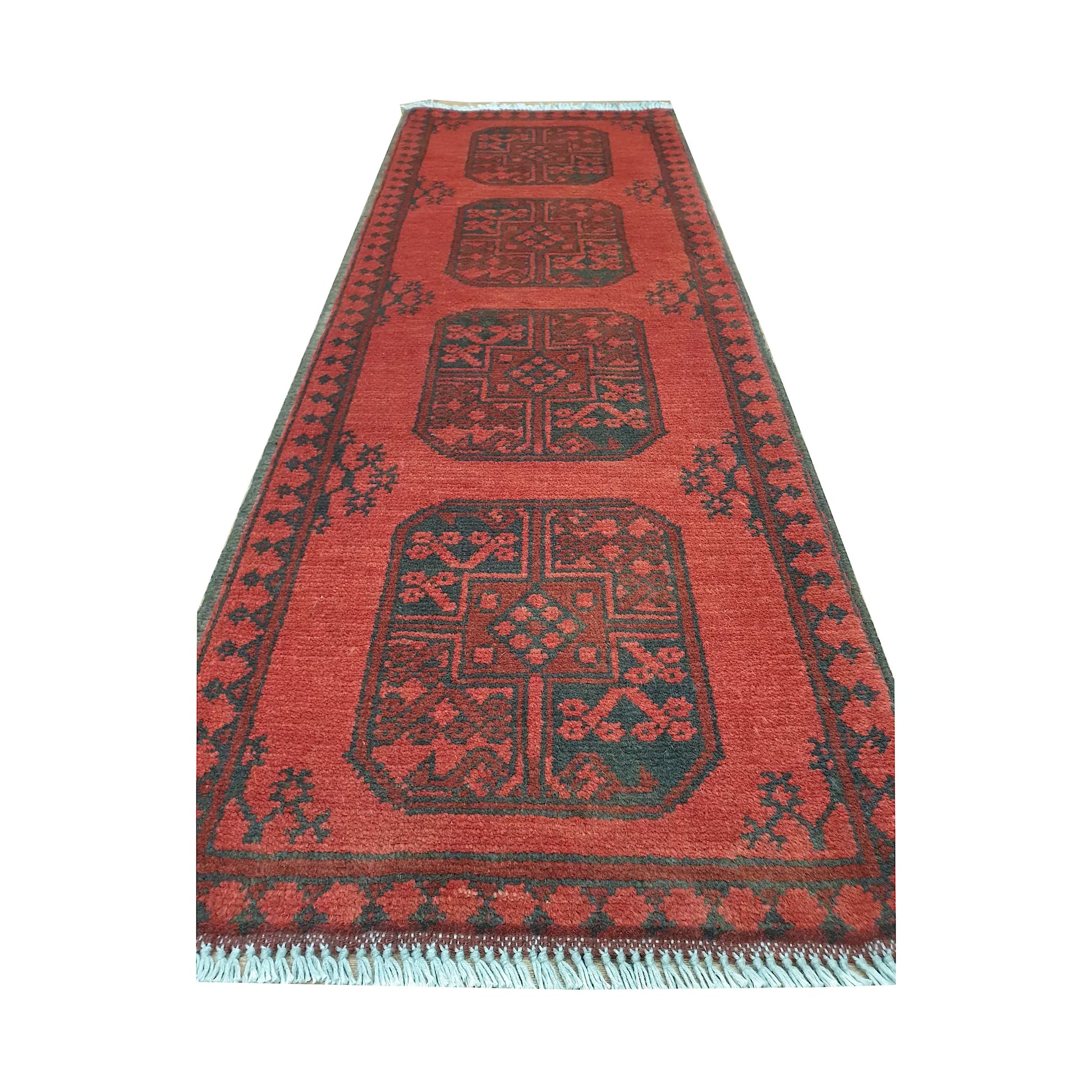 End field and fringe detail of Afghan Turkoman runner rug with red ground, four gul medallions and dark border