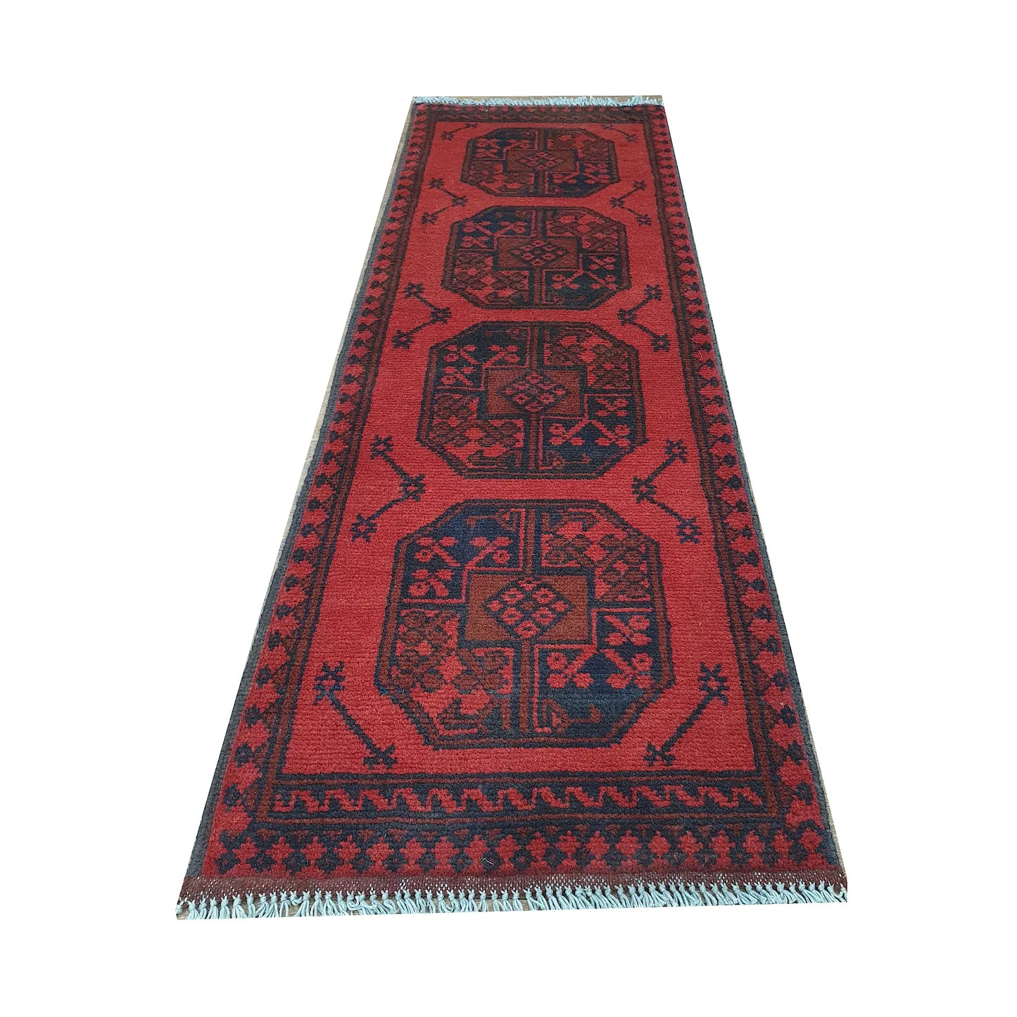 End field and fringe detail of Afghan Turkoman runner rug with red ground, four gul medallions and dark border