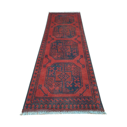 End field and fringe detail of Afghan Turkoman runner rug with four gul medallions, red ground and dark border