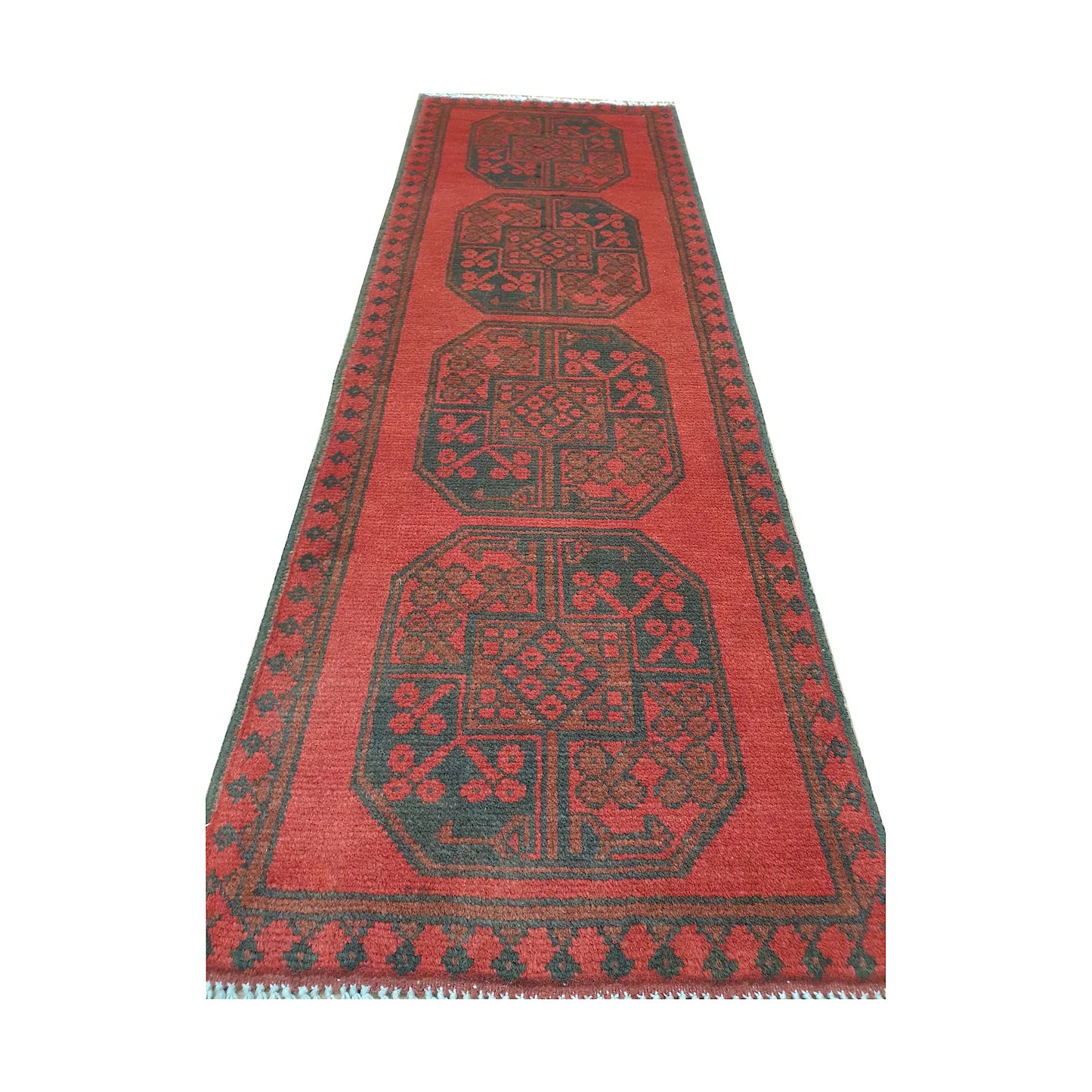 End field detail of Afghan Turkoman runner rug with stepped gul medallions, geometric border and visible fringe