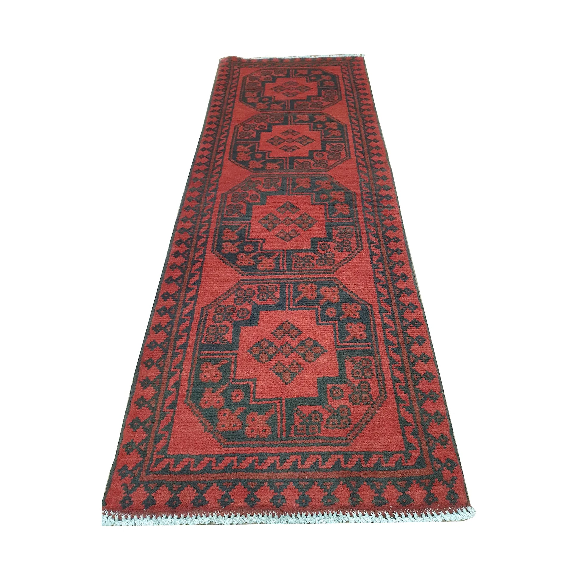 End field detail of Afghan Turkoman runner rug with octagonal gul medallions, red ground and visible fringe