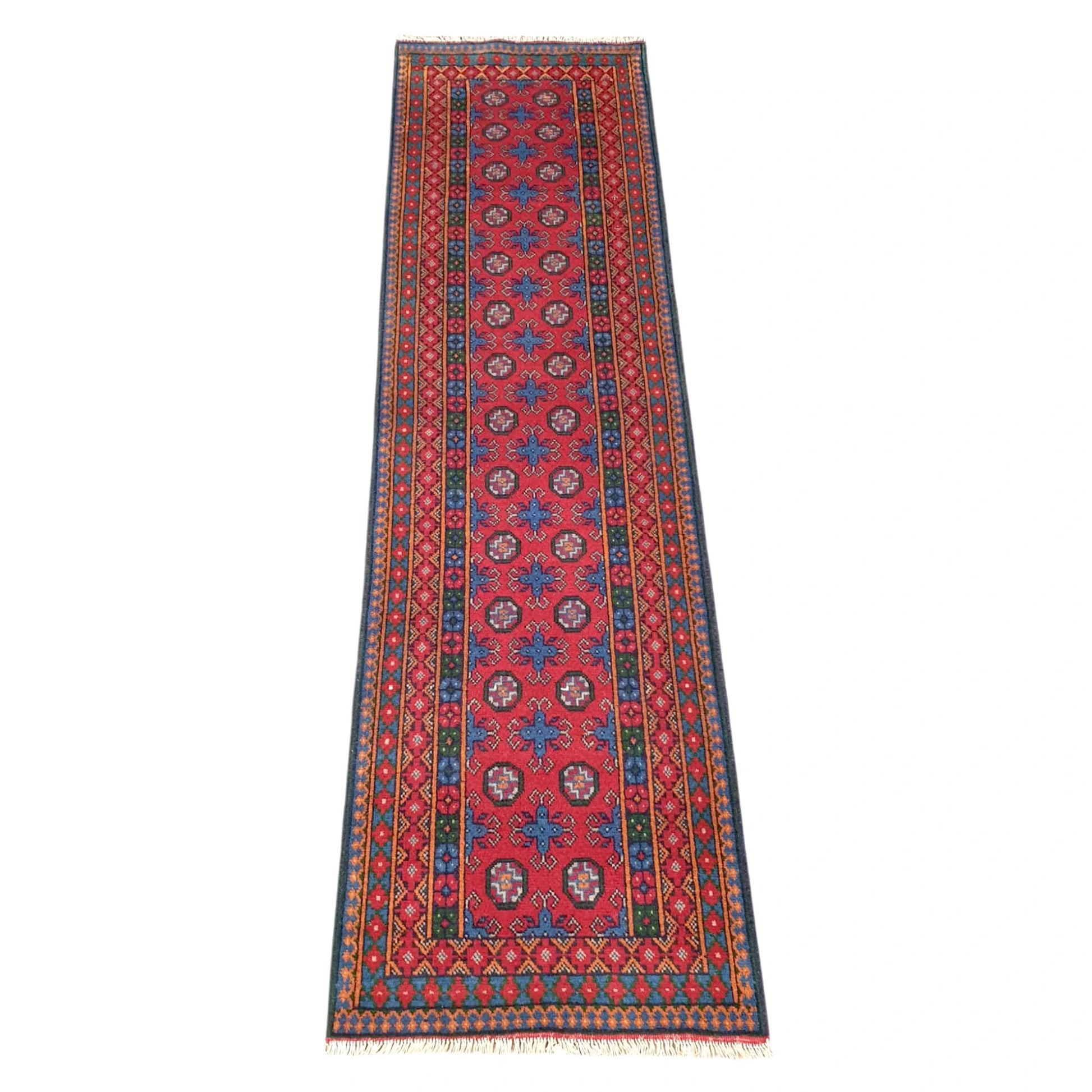 Full view of Afghan Turkoman runner rug, 287 x 83 cm, with a red field and blue geometric medallions